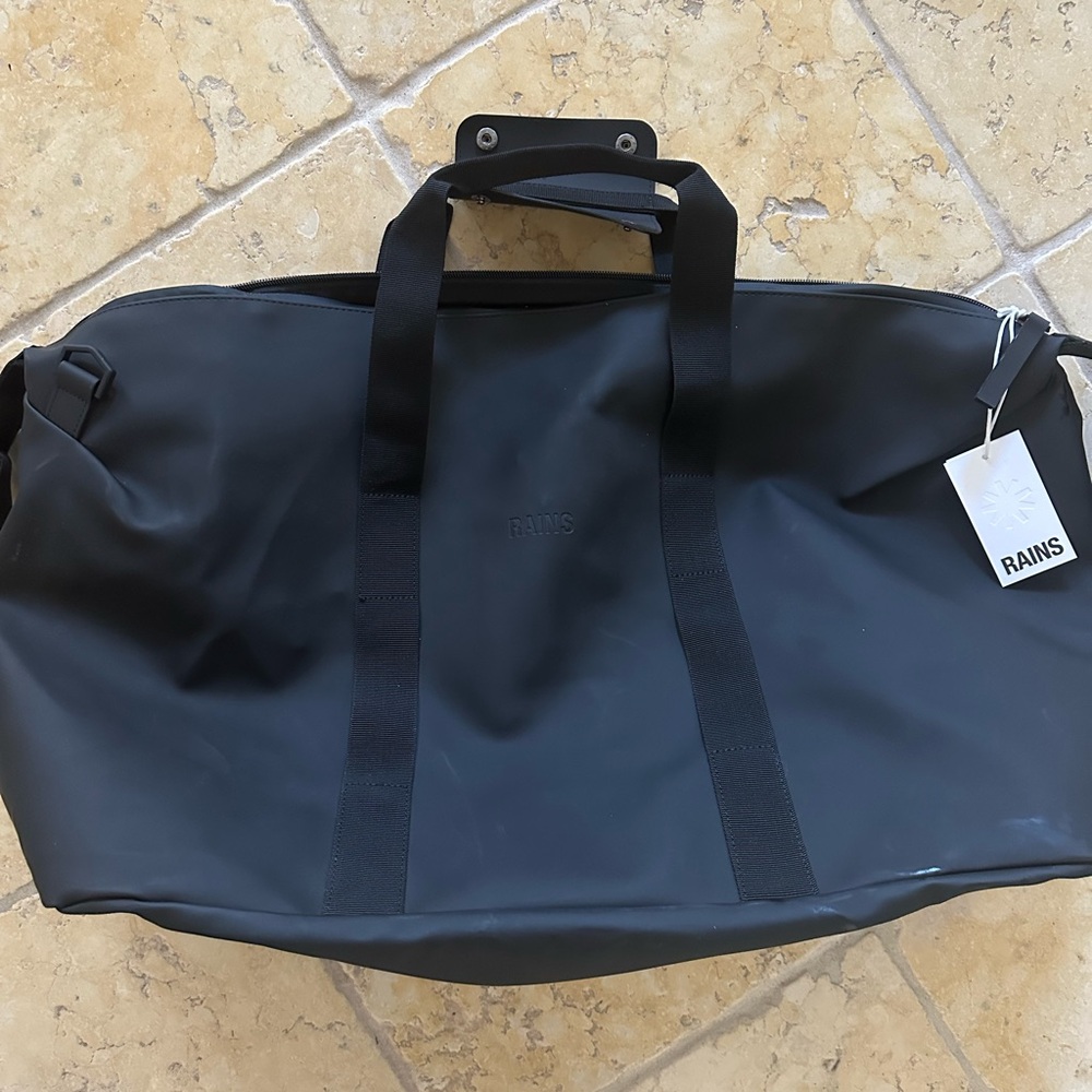 Brand new with tags Rains Waterproof duffle